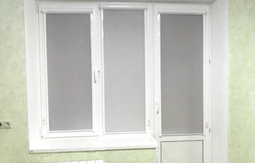 рулонные жалюзи на окно и балконную дверь
